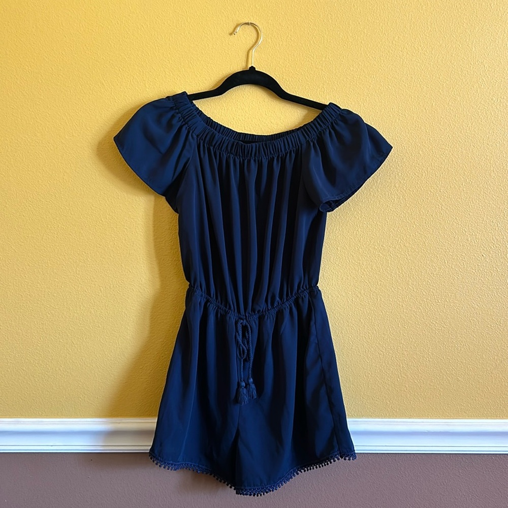 A blue romper from Khol’s. Has been worn a couple times but in good shape.